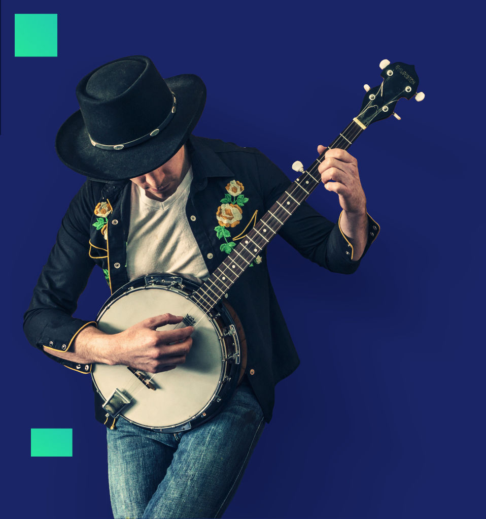 A musician in a cowboy hat playing the banjo